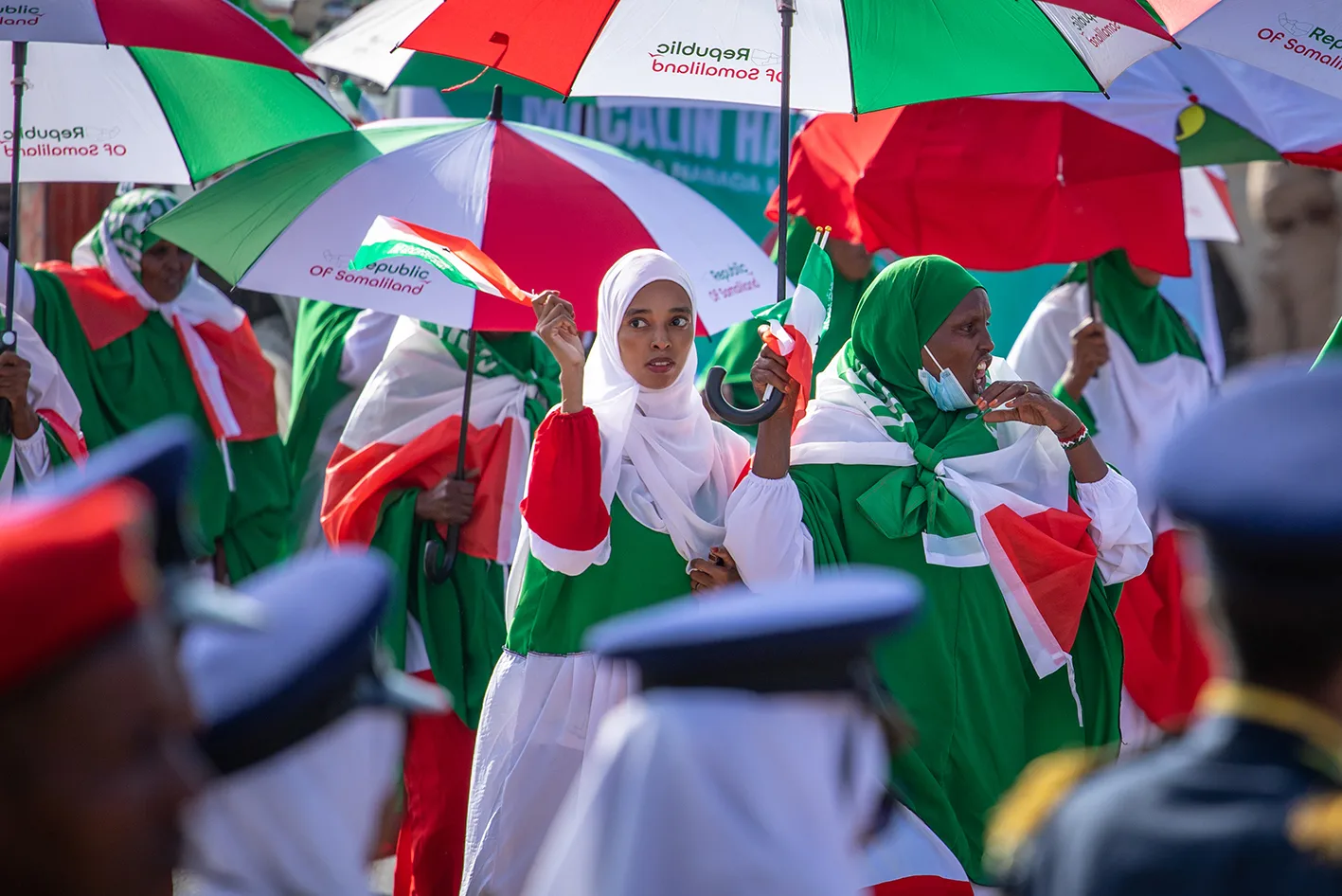 Somalilanders celebrating Independence Day with flags and umbrellas